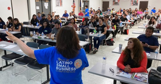  Sandra Barrera, Rural Prosperity Nebraska Extension educator, welcomes attendees to the 2022 Latino Small Business Conference in Omaha. (Russell Shaffer/Rural Prosperity Nebraska)